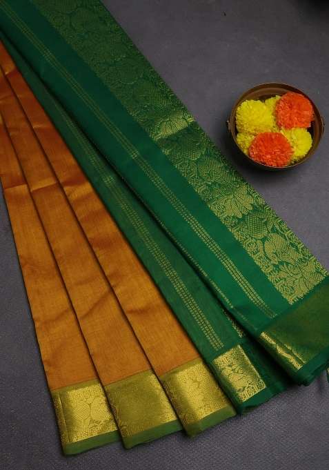 Silk Cotton Saree Dark Mustard And Green With Plain Body And Peacock Zari Woven Border With Traditional Woven Design For Women