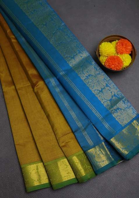 Silk Cotton Saree Dark Mustard And Dual Shade Of Bluish Green With Plain Body And Peacock Zari Woven Border With Traditional Woven Design For Women
