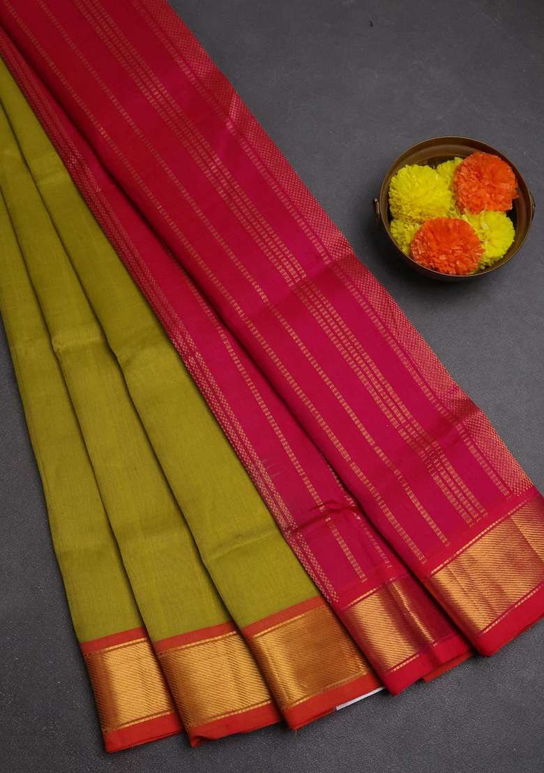 Silk Cotton Saree Mustard Green Shade And Pink With Plain Body And Zari Woven Border With Traditional Woven Design For Women - Indya