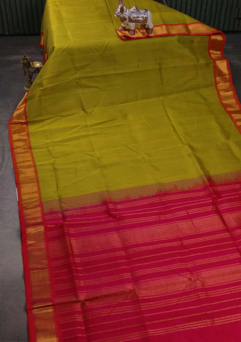 Silk Cotton Saree Mustard Green Shade And Pink With Plain Body And Zari Woven Border With Traditional Woven Design For Women - Indya