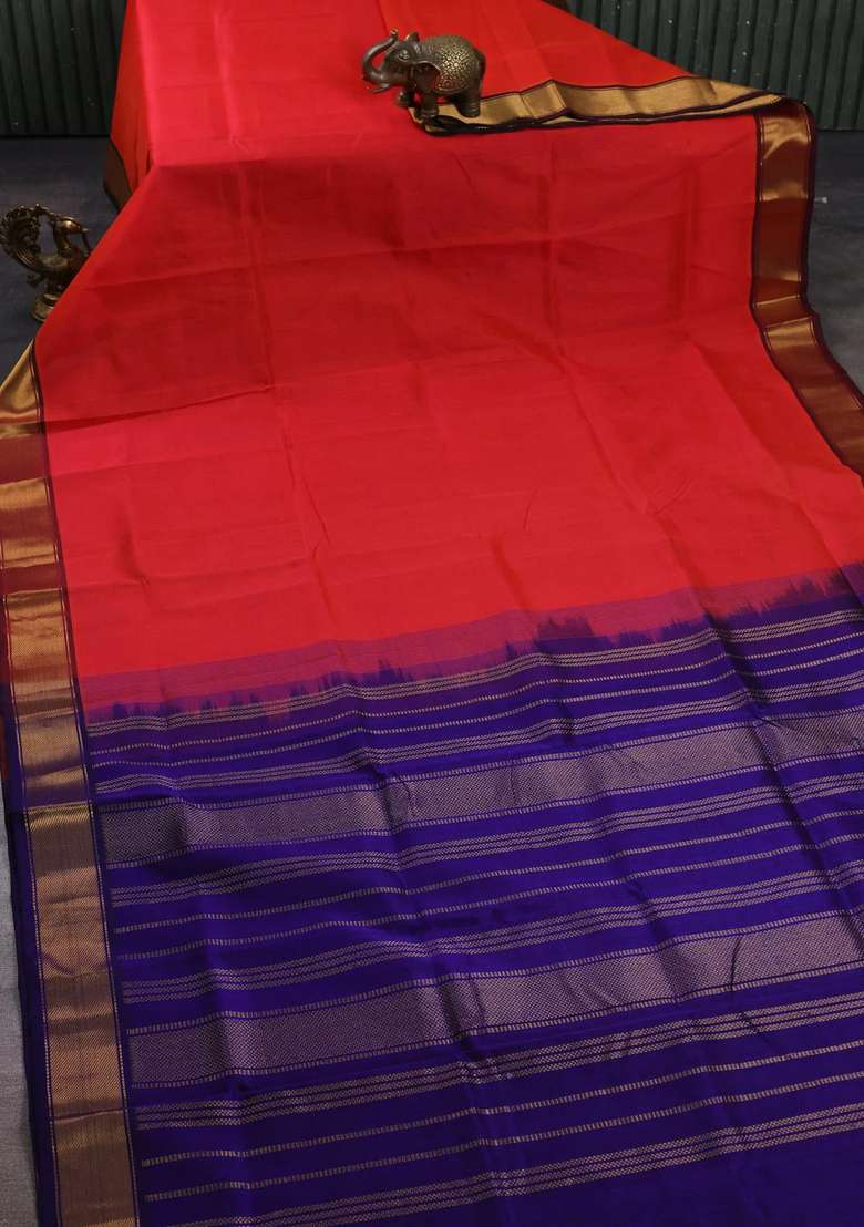 Silk Cotton Saree Dual Shade Of Pinkish Orange And Blue With Plain Body And Zari Woven Border With Traditional Woven Design For Women - Indya