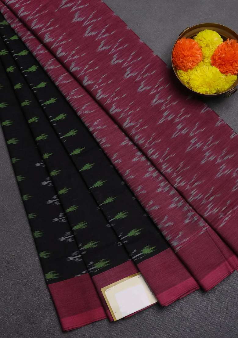 Ikat Cotton Saree Black And Peach Pink With Allover Ikat Woven Butta Weaves And Simple Border With Buttas And Brocade Design For Women - Indya