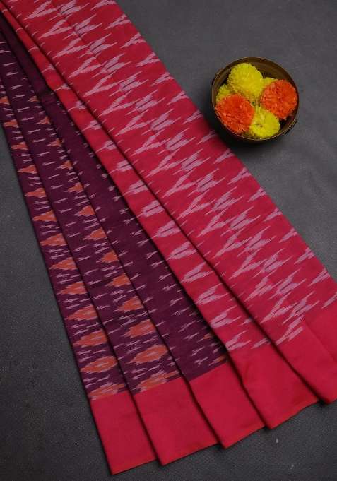 Ikat Cotton Saree Wine Shade And Pink With Allover Ikat Weaves And Simple Border With Traditional Woven Design For Women