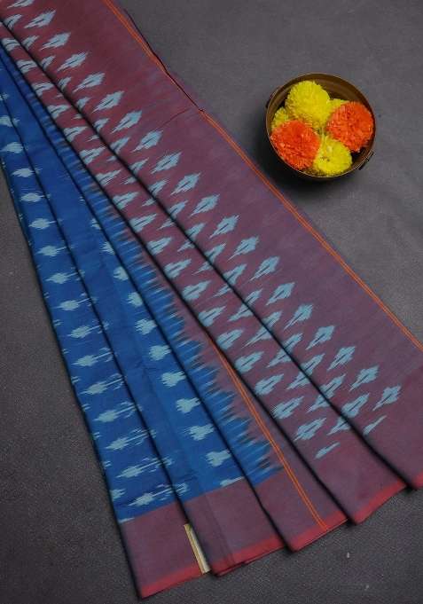 Ikat Cotton Saree Blue And Pink With Allover Ikat Woven Butta Weaves And Simple Border With Buttas And Brocade Design For Women
