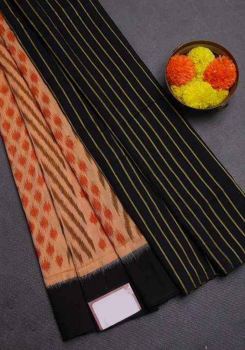 Ikat Cotton Saree Peach Shade And Black With Allover Ikat Weaves And Simple Border With Traditional Woven Design For Women