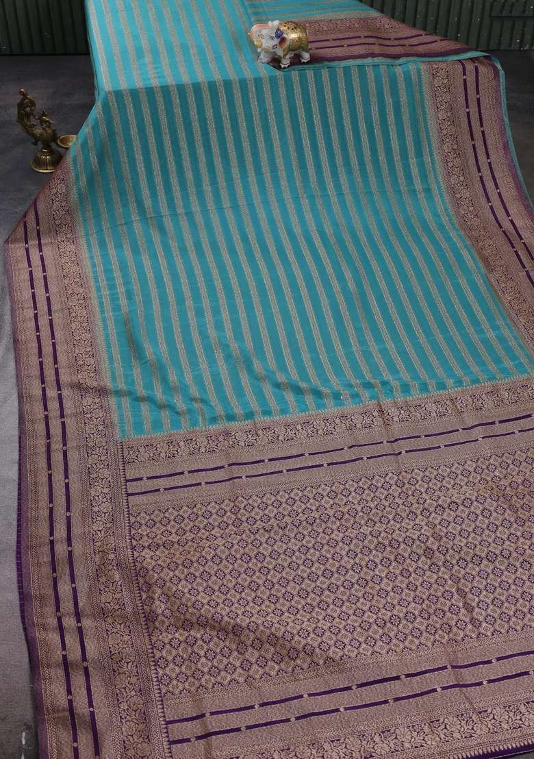 Banarasi Semi Crepe Saree Pastel Blue And Violet With Allover Thread Zari Weaves And Woven Border With Traditional Woven Design For Women - Indya