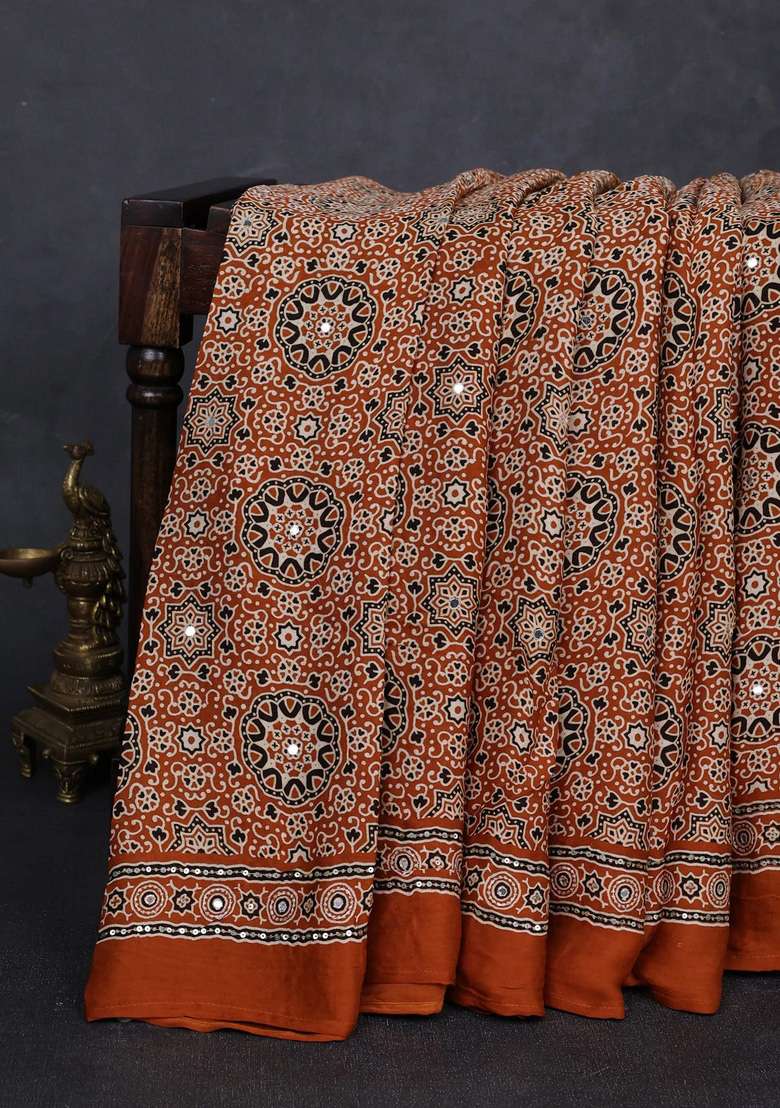 Modal Silk Saree Dark Mustard With Allover Ajrakh Prints And Mirror Sequin Embroidery Pallu With Embroidered Design For Women - Indya