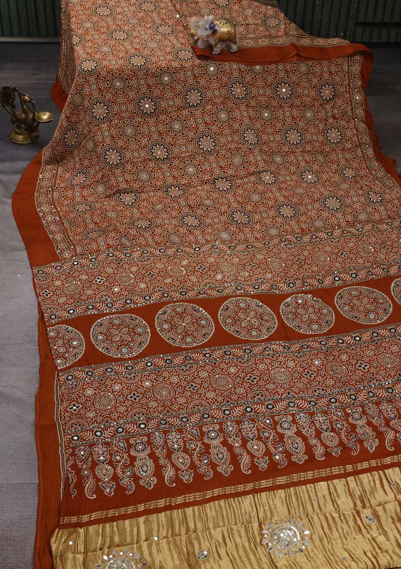 Modal Silk Saree Dark Mustard With Allover Ajrakh Prints And Mirror Sequin Embroidery Pallu With Embroidered Design For Women - Indya