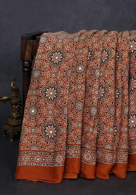 Modal Silk Saree Dark Mustard With Allover Ajrakh Prints And Mirror Sequin Embroidery Pallu With Embroidered Design For Women