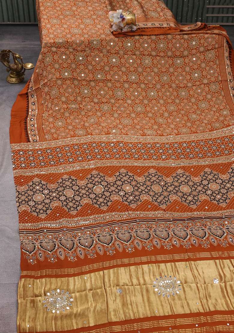 Modal Silk Saree Dark Mustard With Allover Ajrakh Prints And Mirror Sequin Embroidery Pallu With Embroidered Design For Women - Indya