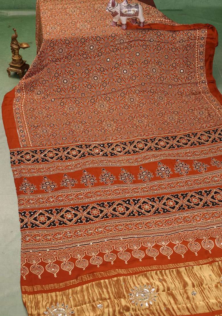 Modal Silk Saree Dark Mustard With Allover Ajrakh Prints And Mirror Sequin Embroidery Pallu With Embroidered Design For Women - Indya
