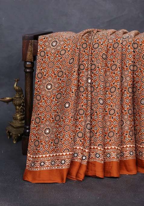 Modal Silk Saree Dark Mustard With Allover Ajrakh Prints And Mirror Sequin Embroidery Pallu With Embroidered Design For Women