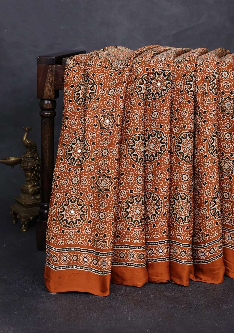 Modal Silk Saree Dark Mustard With Allover Ajrakh Prints And Mirror Sequin Embroidery Pallu With Embroidered Design For Women - Indya