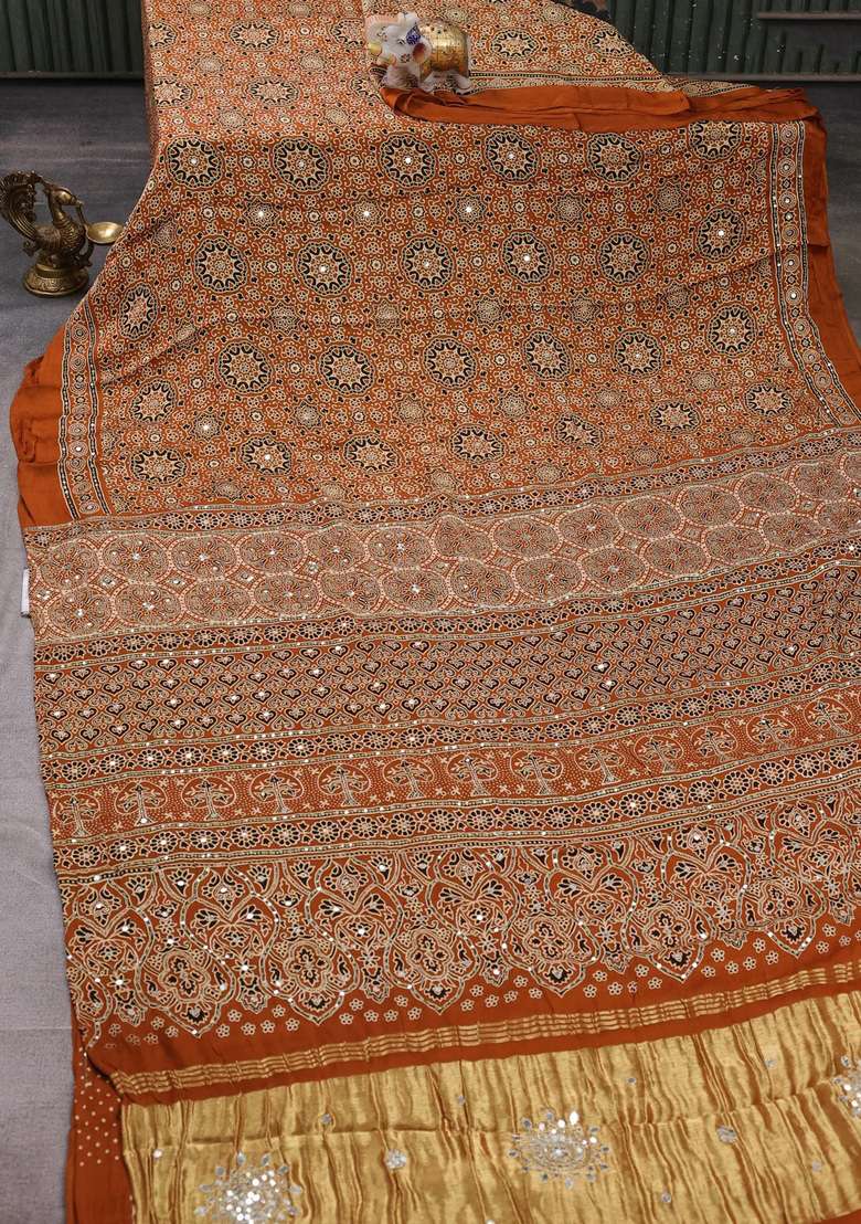Modal Silk Saree Dark Mustard With Allover Ajrakh Prints And Mirror Sequin Embroidery Pallu With Embroidered Design For Women - Indya
