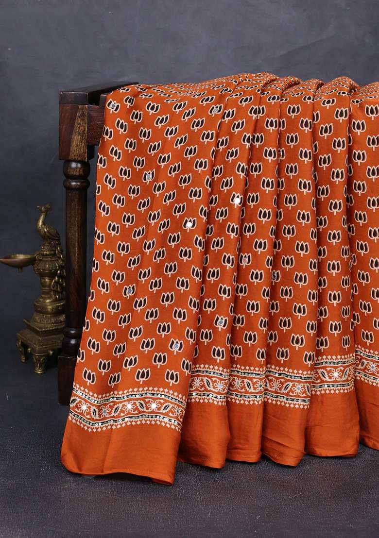 Modal Silk Saree Dark Mustard With Allover Ajrakh Prints And Mirror Sequin Embroidery Pallu With Embroidered Design For Women - Indya