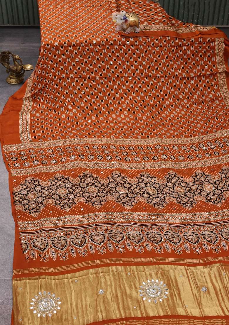 Modal Silk Saree Dark Mustard With Allover Ajrakh Prints And Mirror Sequin Embroidery Pallu With Embroidered Design For Women - Indya