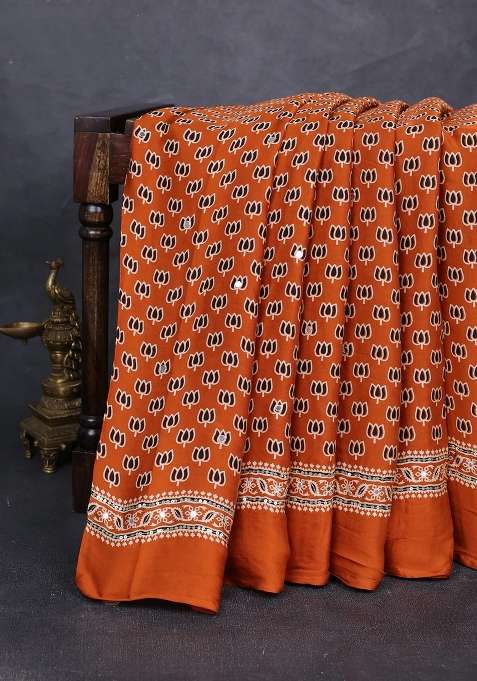 Modal Silk Saree Dark Mustard With Allover Ajrakh Prints And Mirror Sequin Embroidery Pallu With Embroidered Design For Women