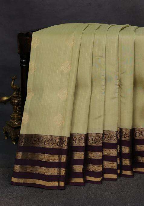 Pista Green Wine Kanchipuram Silk Weaves Saree With Traditional Woven Design For Women