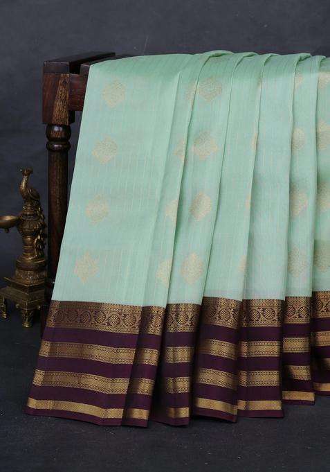 Pista Green Wine Kanchipuram Silk Weaves Saree With Traditional Woven Design For Women