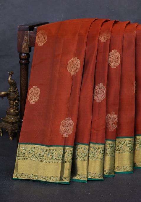 Rust Green Kanchipuram Silk Buttas Saree With Buttas And Brocade Design For Women