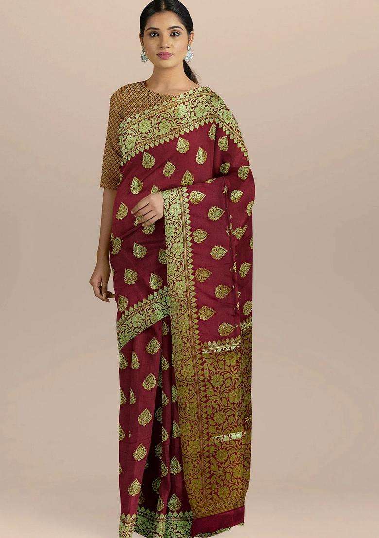 Maroon Color Silk Saree With All Over Zari Border And Heavy Pallu With Traditional Woven Design For Women - Indya