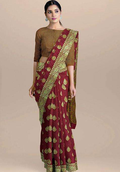 Maroon Color Silk Saree With All Over Zari Border And Heavy Pallu With Traditional Woven Design For Women