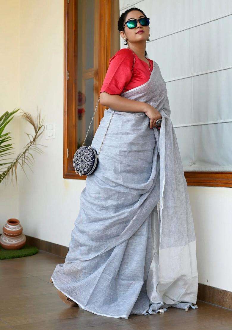 Light Blue Color Pure Linen Handloom Saree With Traditional Woven Design For Women - Indya