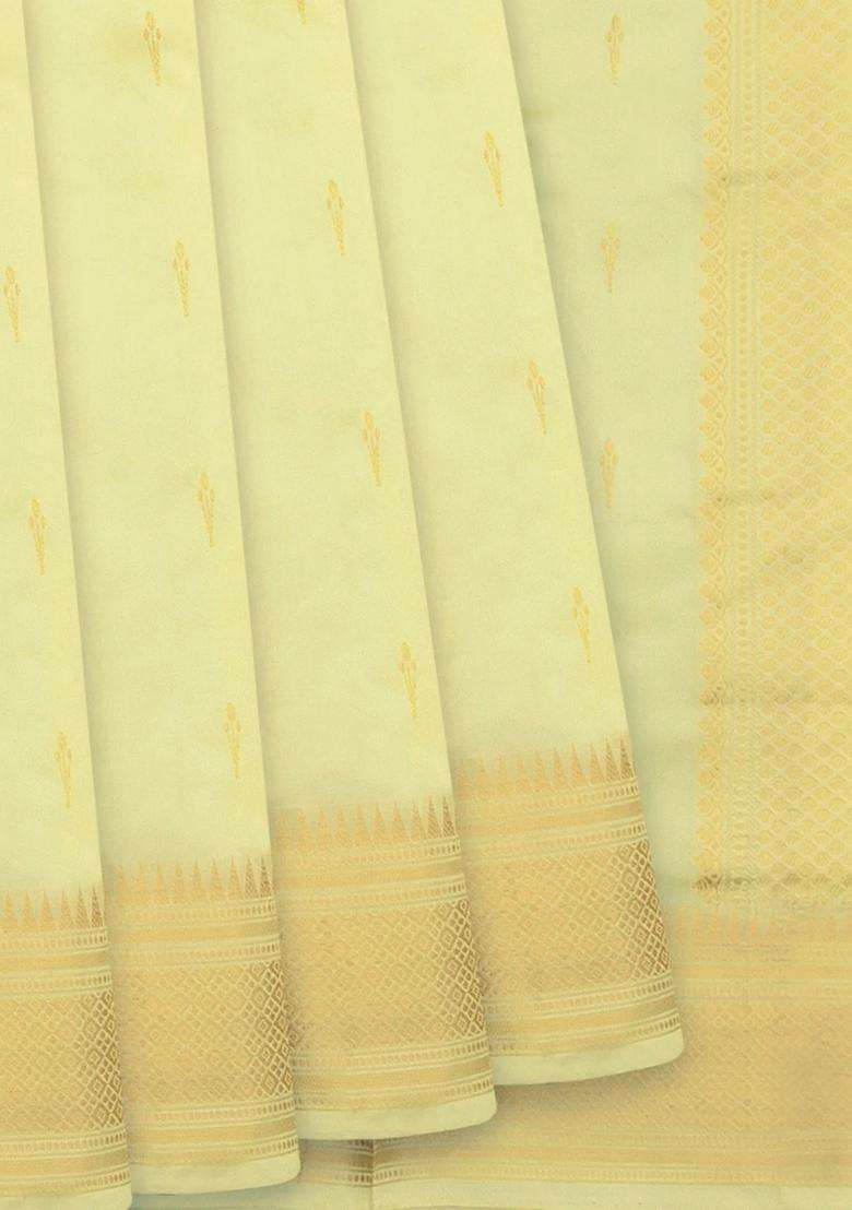 Cream Banarasi Silk Saree With Floral Butta Cream With Buttas And Brocade Design For Women - Indya