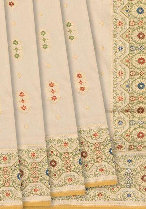 Cream Handloom Banarasi Silk Saree With Floral Meenakari Butta Border Cream With Buttas And Brocade Design For Women