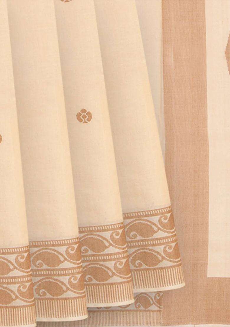 Cream Handwoven Tussar Silk Saree With Kamalam Motifs Mango Vine Motifs In Border Cream With Buttas And Brocade Design For Women - Indya