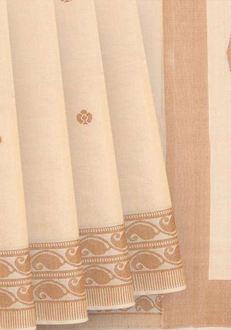 Cream Handwoven Tussar Silk Saree With Kamalam Motifs Mango Vine Motifs In Border Cream With Buttas And Brocade Design For Women