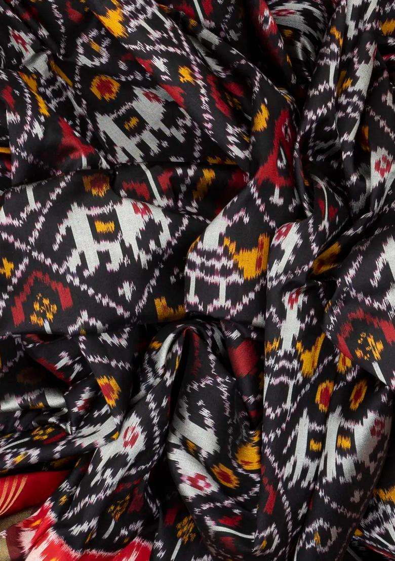 Black Handloom Ikat Silk Saree With Contrast Red Border With Printed Design For Women - Indya