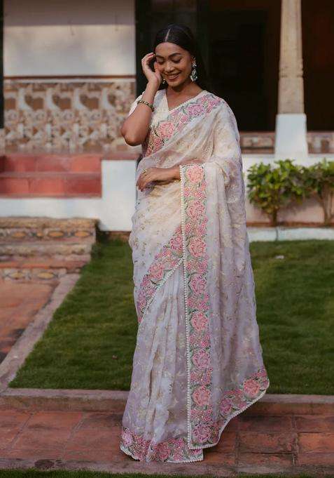 Cream Woven Organza Silk Saree With Embroidered Floral Motifs For Women