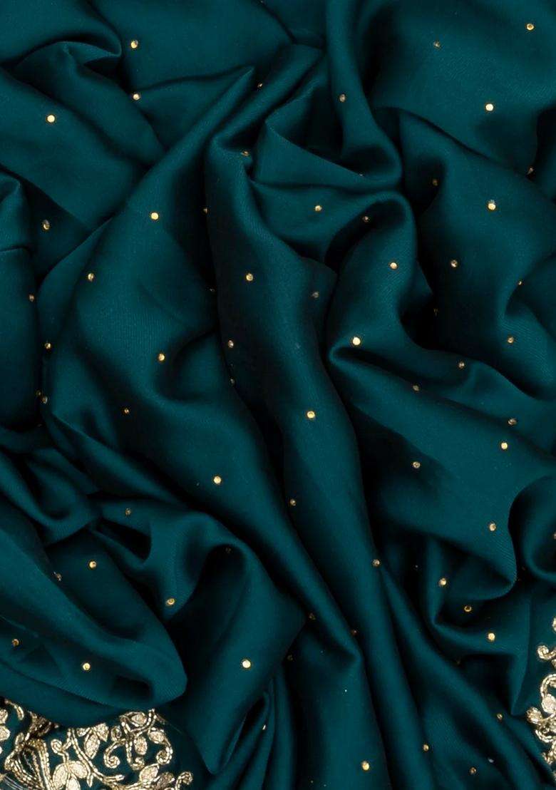 Teal Woven Georgette Saree With Embroidered Border For Women - Indya