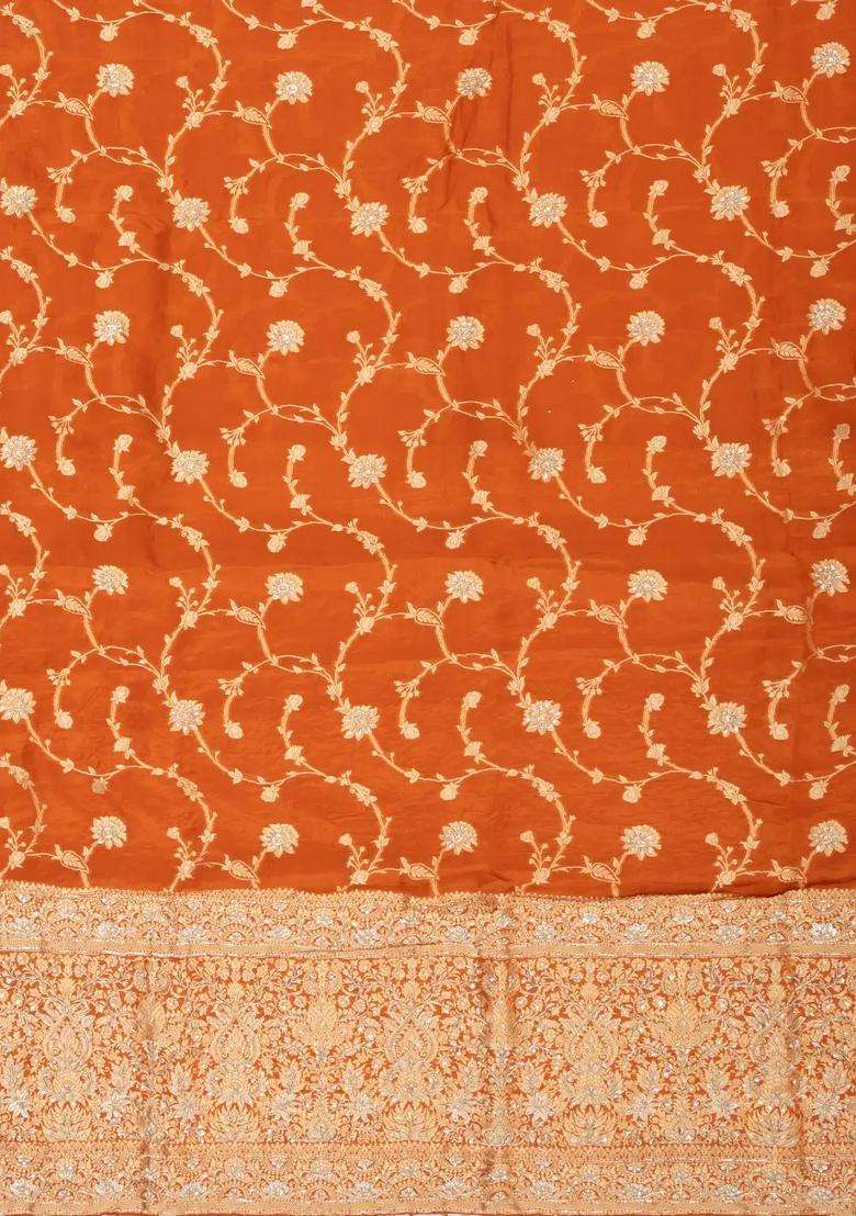 Rust Woven Crepe Saree With Brocaded Embroidery Floral Motifs With Embroidered Design For Women - Indya