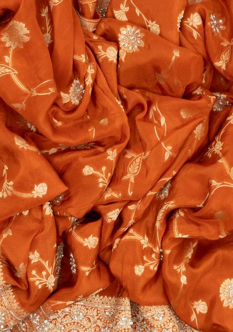 Rust Woven Crepe Saree With Brocaded Embroidery Floral Motifs With Embroidered Design For Women - Indya