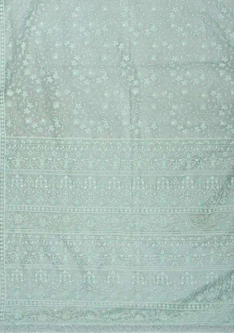 Turquoise Woven Organza Saree With Embroidered Floral Motifs For Women - Indya