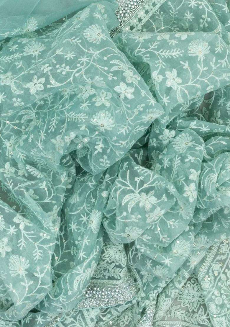Turquoise Woven Organza Saree With Embroidered Floral Motifs For Women - Indya