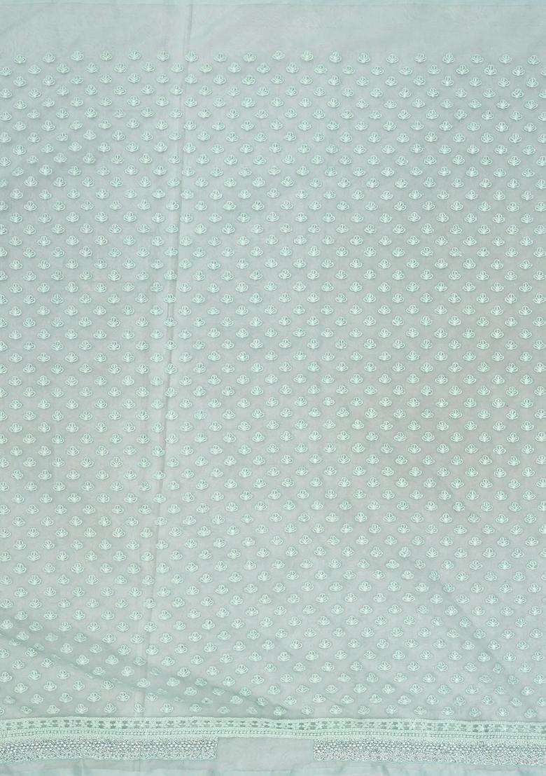 Turquoise Woven Organza Saree With Embroidered Floral Motifs For Women - Indya