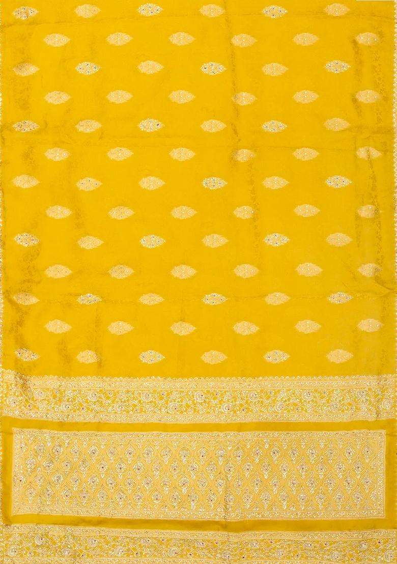 Mustard Woven Georgette Saree With Brocade Hand Embroidered Motifs For Women - Indya
