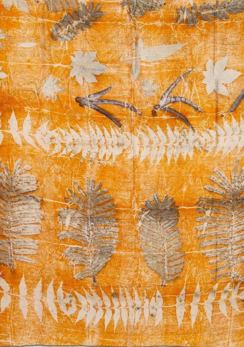 Orange Handloom Tussar Silk Saree With Eco Printed Motifs For Women - Indya