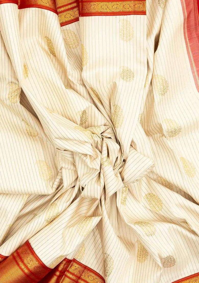 Off White Handloom Korvai Kanchipuram Silk Saree With Stripes Buttas With Korvai And Temple Border Design For Women - Indya