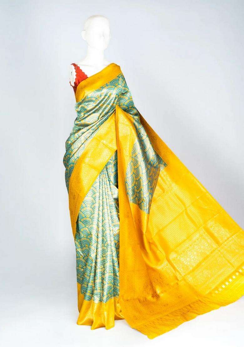 Yellow Woven Blended Tissue Silk Saree With Elephant Motifs With Buttas And Brocade Design For Women - Indya