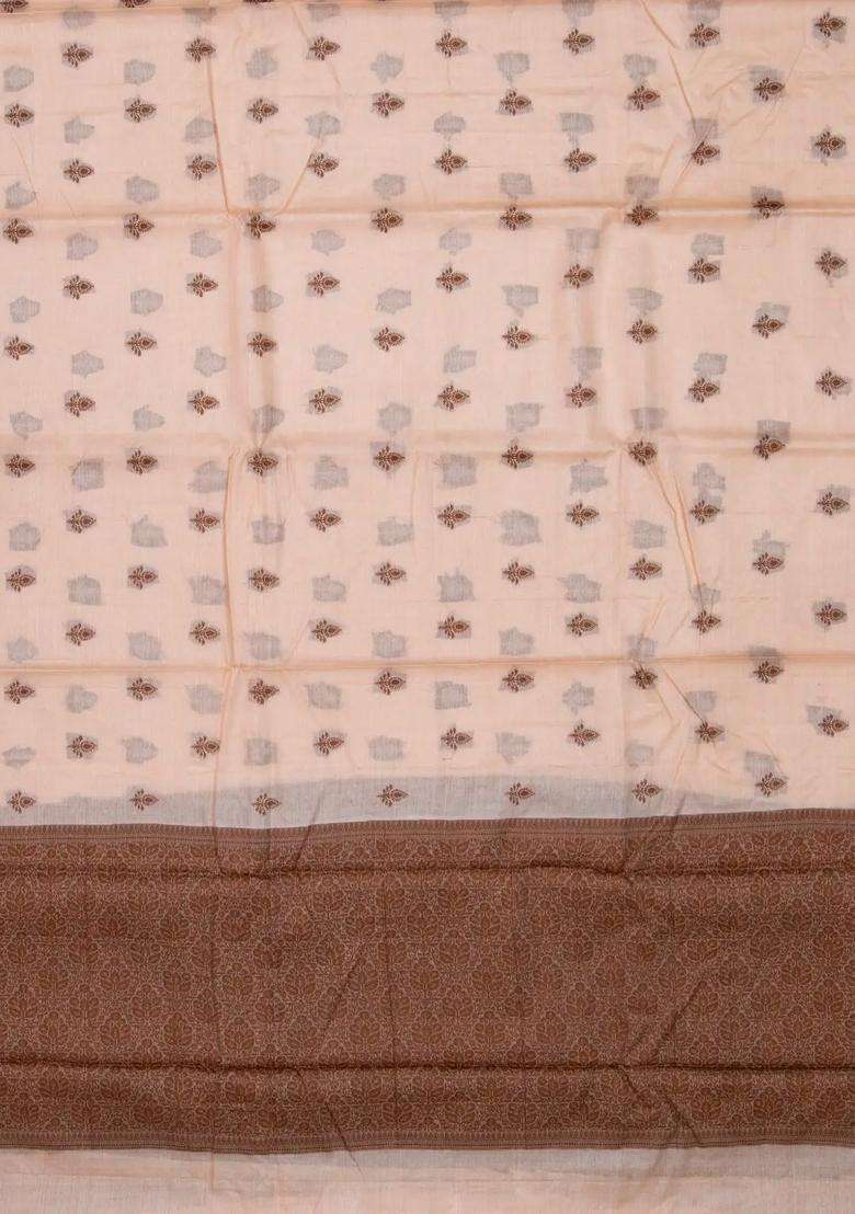 Light Peach Woven Tussar Silk Saree With Floral Buttas With Buttas And Brocade Design For Women - Indya