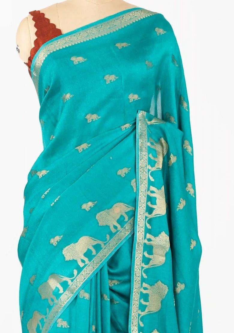 Turquoise Woven Synthetic Dola Silk Saree With Lion Motifs With Buttas And Brocade Design For Women - Indya