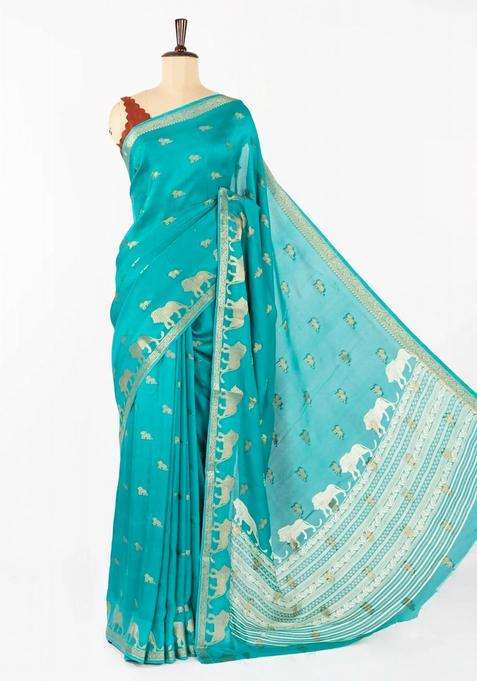 Turquoise Woven Synthetic Dola Silk Saree With Lion Motifs With Buttas And Brocade Design For Women