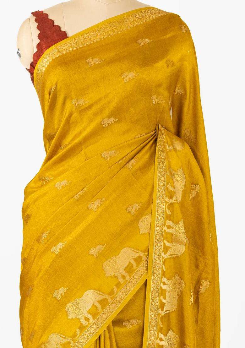 Mustard Woven Synthetic Dola Silk Saree With Lion Motifs With Buttas And Brocade Design For Women - Indya