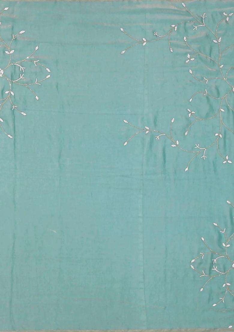 Turquoise Woven Blended Tissue Saree With Embroidered Floral Motifs For Women - Indya