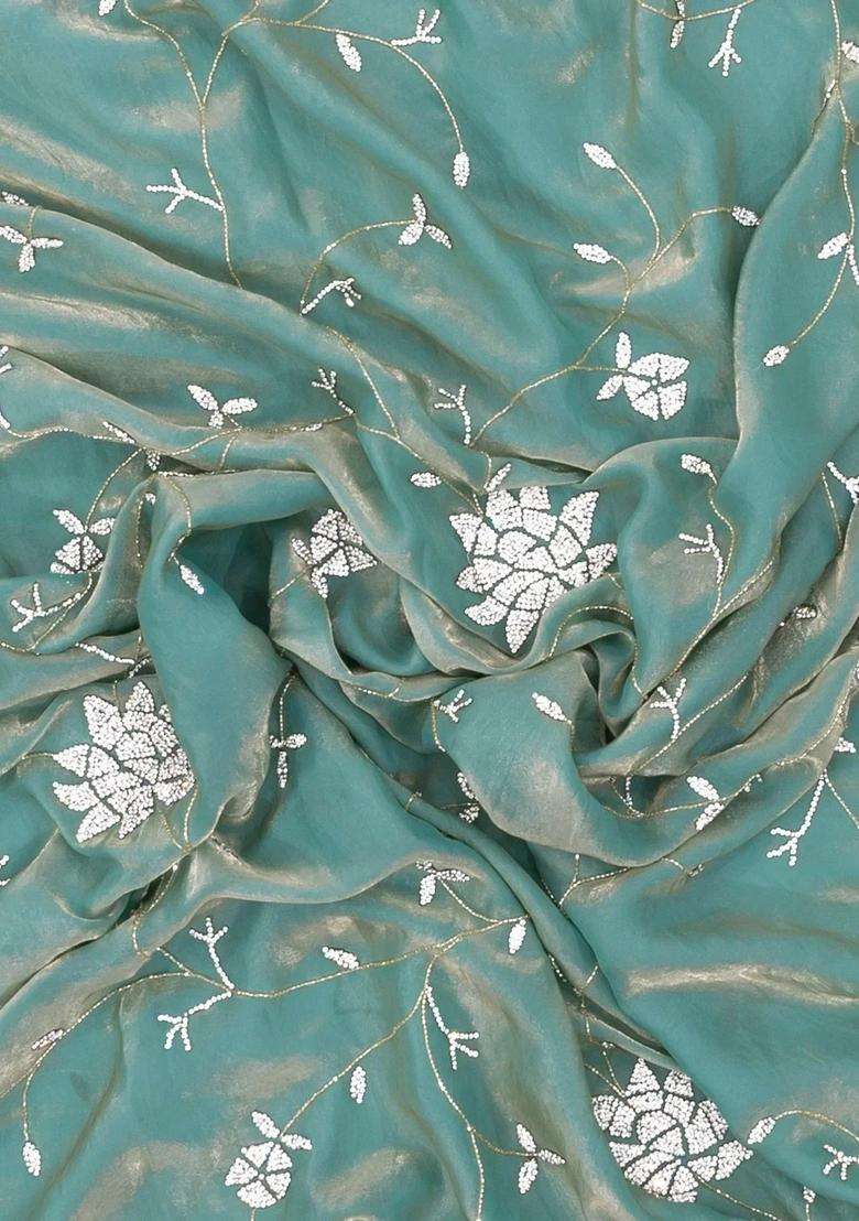 Turquoise Woven Blended Tissue Saree With Embroidered Floral Motifs For Women - Indya