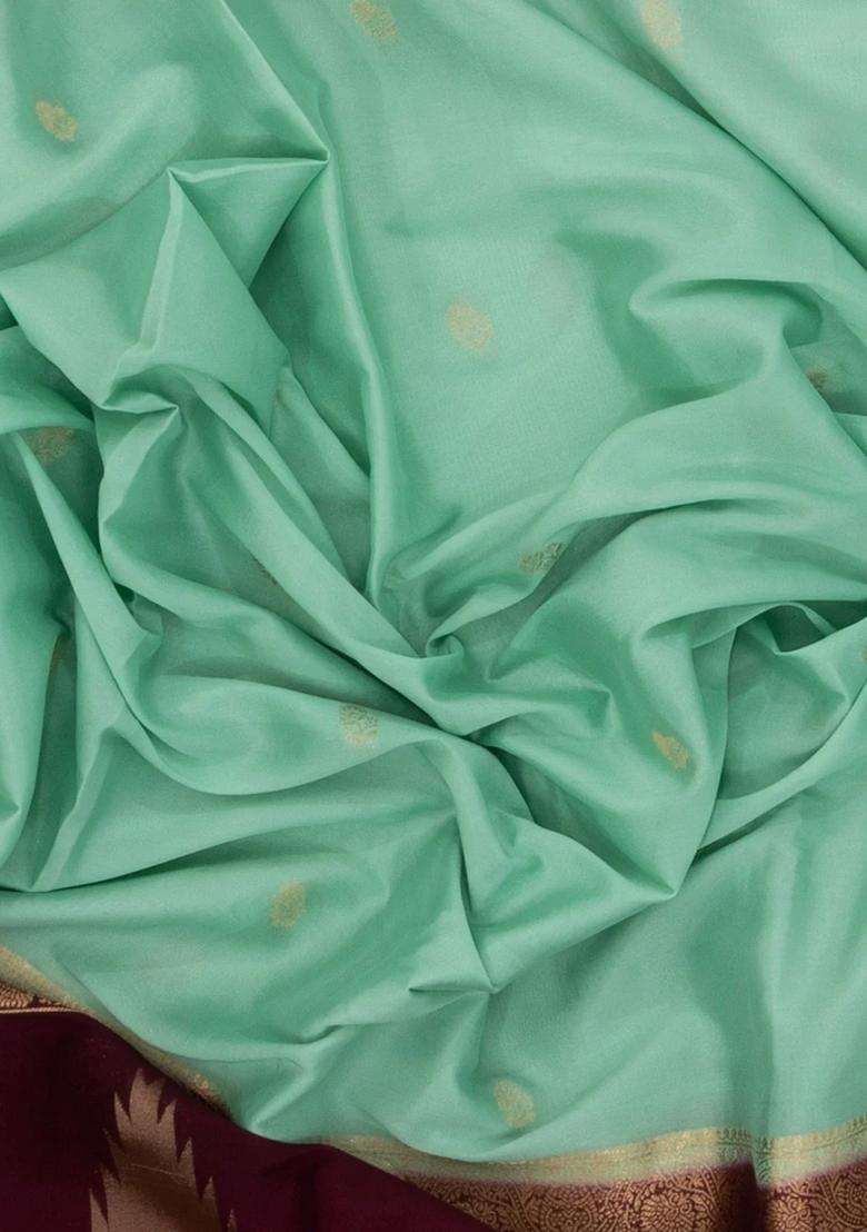 Aquamarine Woven Art Crepe Saree With Buttas Contrast Border With Buttas And Brocade Design For Women - Indya